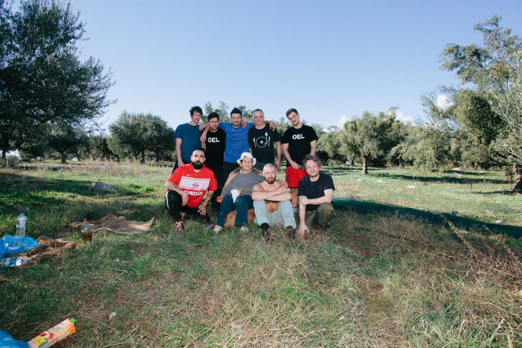 Alex (bottom right) with the OEL team, his olive oil suppliers, harvesting olives in Kalamata, Greece. Image © Simone Artale, courtesy Alexander Brosin