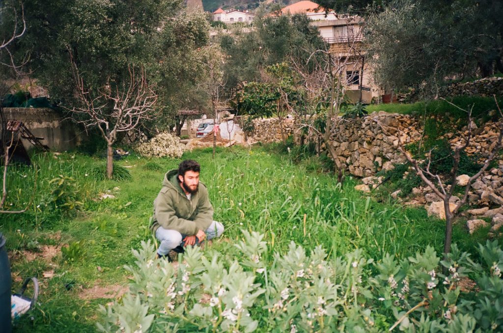 Bahaa in his garden Shot with a Yashica T5 on Kodak Portra 400, 35mm © Thalia Bassim