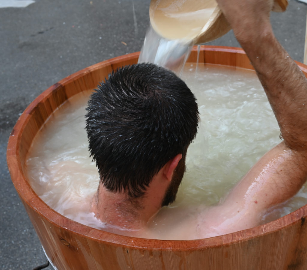 "Kitchenbath" project by Philipp Kolmann and Anastasia Eggers, Vienna Design Week 2020; bathing in whey after the cheese has been made. Photo © Anastasia Eggers & Philipp Kolmann