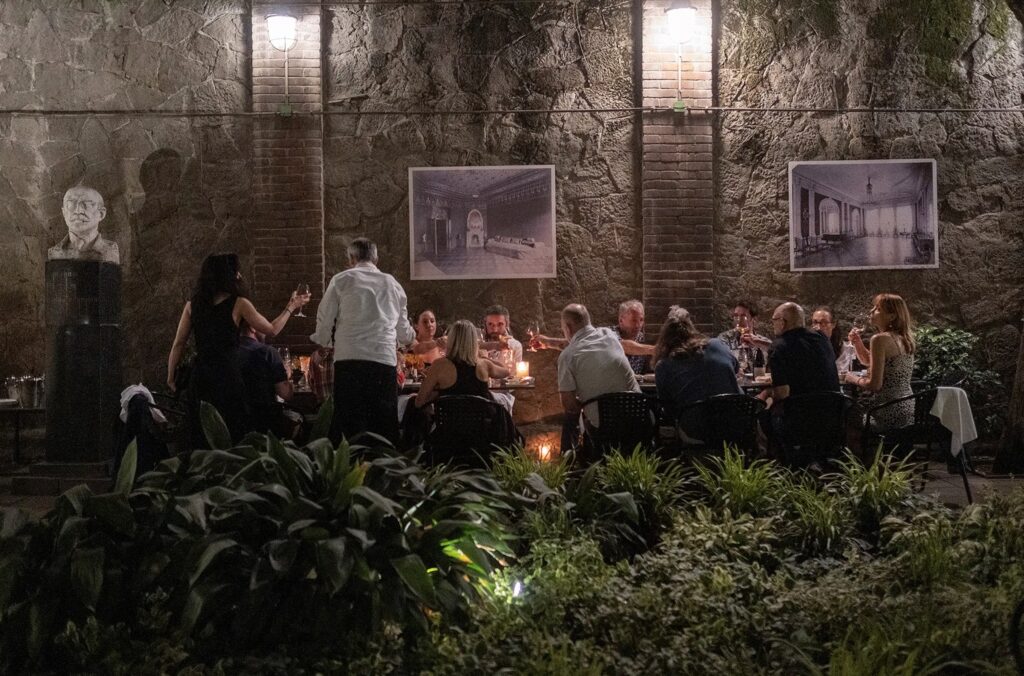 people sittimg together at a dinner table