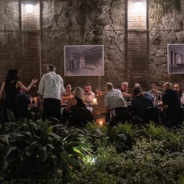 people sittimg together at a dinner table