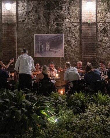 people sittimg together at a dinner table