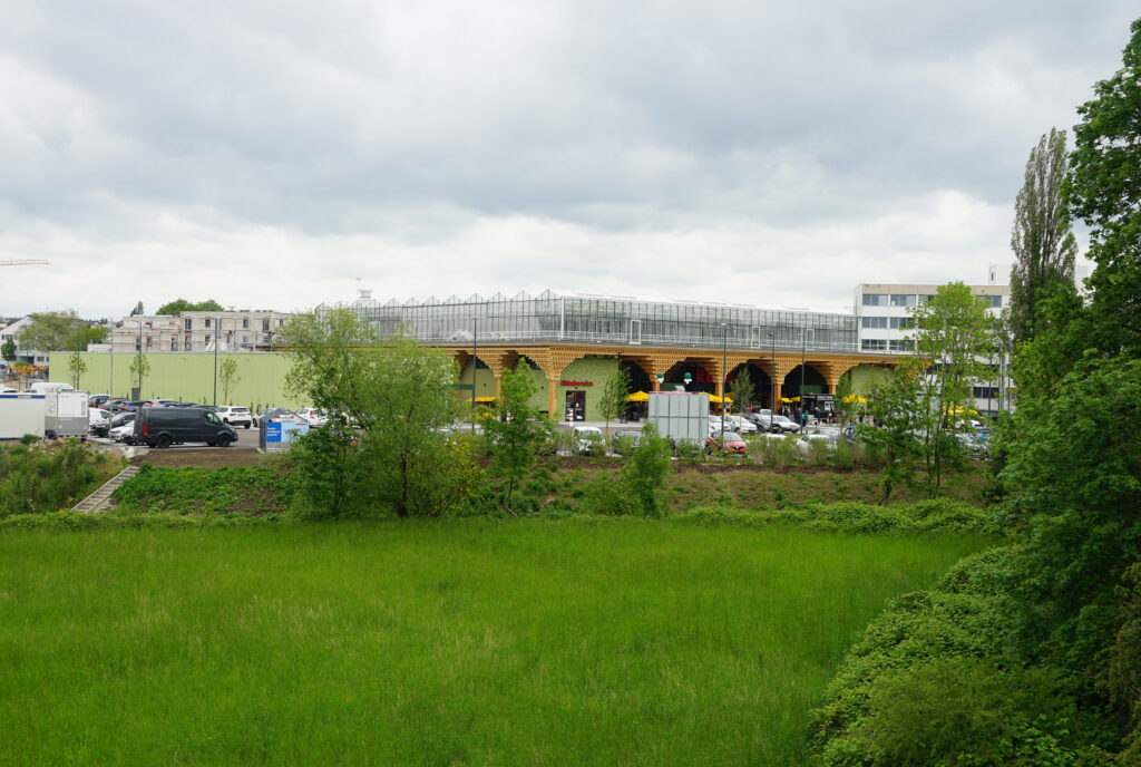 View of the Rewe Green Farming store in Wiesbaden. Image © Acme.