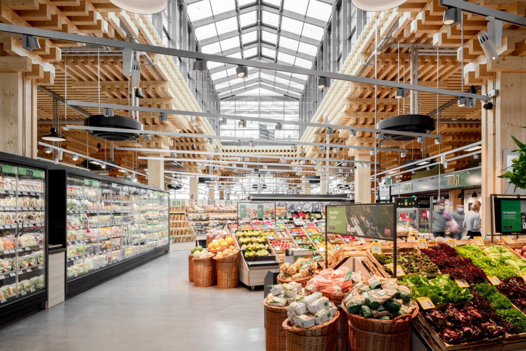 View of the Wiesbaden Green farming supermarket interior, designed by Acme architects. Image © Heipler Brunier, courtesy Acme.
